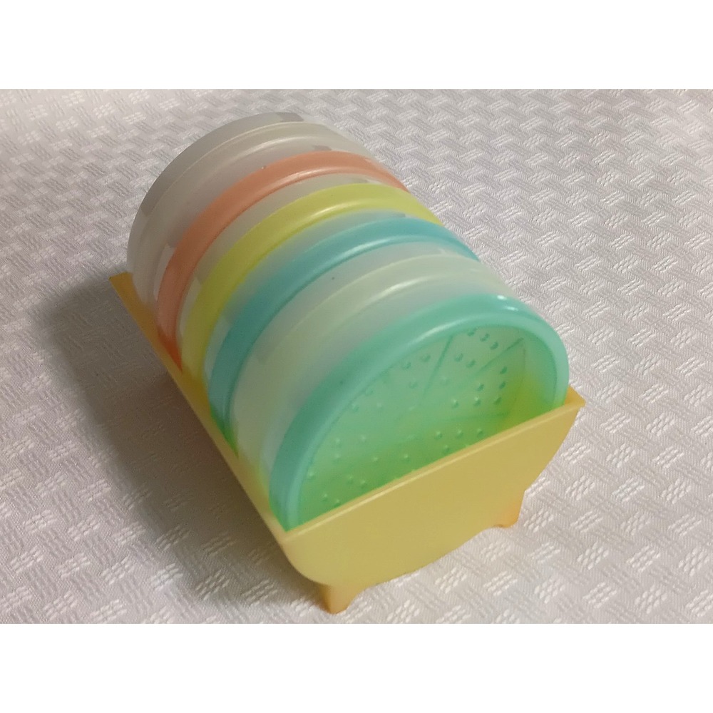 Vintage Tupperware Pastel Wagonwheel Coasters Set of 6 with Caddy/Holder